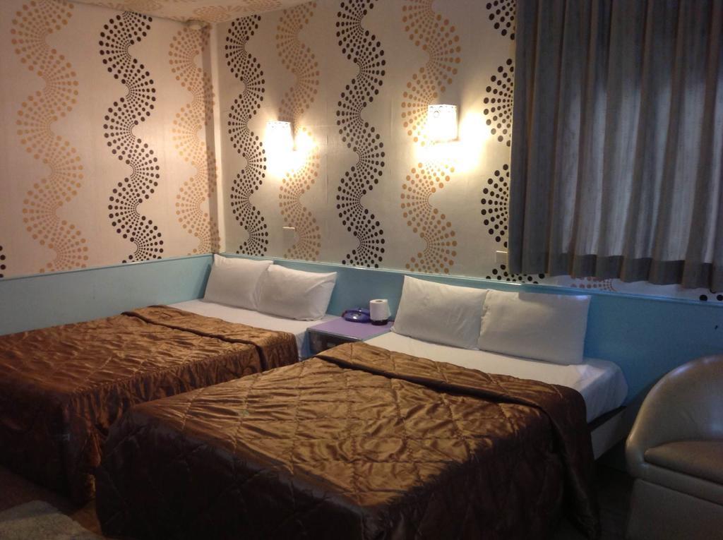 Reui Chung Hotel Kaohsiung Quarto foto